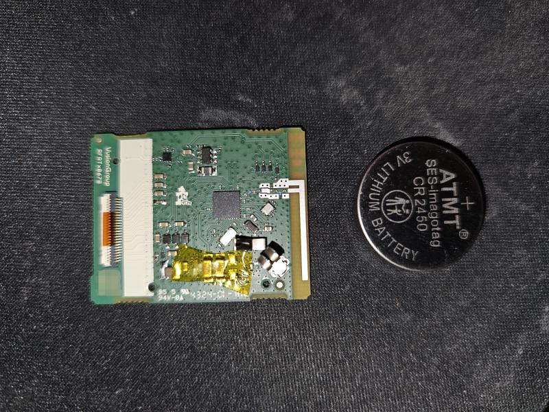 The board next to the CR 2450 battery.
