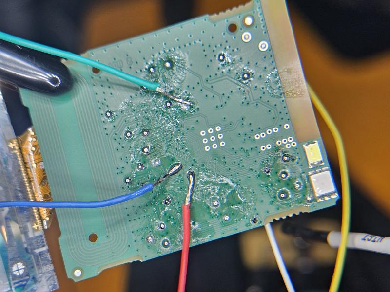 Image of all the wires soldered to the pads on the back.